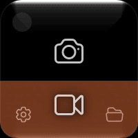 The floating ShotGlass widget: a camera button above a video camera button, with a gear and folder below